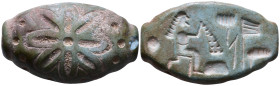 Roman/Ptolemaic decorative element with floral decoration and a working figure, possibly a fisherman.  37mm, 8,33g