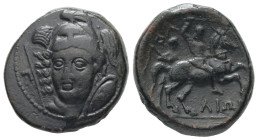 Thessaly, Pharsalos. AE Trichalkon, 8.82 g 20.65 mm. Circa 3rd century BC.
Obv: Helmeted head of Athena facing slightly left with shield and spear; Π ...