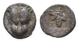 Macedon, Dikaia AR Hemiobol, 0.20 g 6.50 mm. Circa 480-460 BC.
Obv: Head of lioness facing
Rev: Grape bunch within incuse square.

This rare AR he...