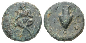 Cyclades, Amorgos, Aegiale, Ae, 4.46 g 17.29 mm. 2nd-1st. Century BC.
Obv: Pan seated facing, legs crossed, holding syrinx in both hands to his mouth...
