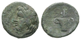 Kings of Thrace, Odrysian regal coinage. Ae, 1.14 g 12.87 mm. 4th-3rd centuries BC. 
Obv: Laureate head of Apollo left.
Rev: Two-handled cup; monogram...