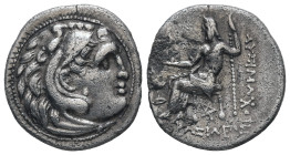 Kings of Thrace (Macedonian). Lysimachos, AR Drachm, 3.94 g 18.95 mm. 305-281 BC. Kolophon.
Obv: Head of Herakles right, wearing lion skin.
Rev: AΛEXA...
