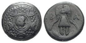 Kings of Macedon, Alexander III 'the Great', Ae, 3.93 g 15.72 mm. 336-323 BC. Uncertain mint in Asia.
Obv: Macedonian shield; on boss, head of Herakle...
