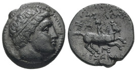 Kings of Macedon, Philip III Arrhidaios, Ae, 3.83 g 18.35 mm. 323-317 BC. Miletos.
Obv: Diademed head of Apollo right.
Rev: BAΣIΛEΩΣ ΦΙΛΙΠΠΟΥ. Horsema...