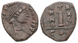 Justinian I, AD 527-565. AE, Decanummium. 3.04 g. 17.66 mm. Constantinople.
Obv: [DNIVS]TINI-ANVSPPAVC. Bust of Justinian I facing right with diadem, ...