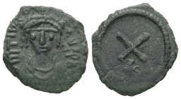 Tiberius II Constantine, AD 578-582. AE, Decanummium. 3.24 g. 19.23 mm. Constantinople.
Obv: δ M TIЬ CO[N- TA PP AVG]. Frontal bust of Tiberius II Con...