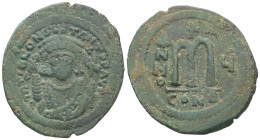 Tiberius II Constantine, AD 578-582. AE, Follis. 16.97 g. 38.26 mm. Constantinople.
Obv: D m TIB CONS-TANT P P AVG. Frontal bust of Tiberius II Consta...