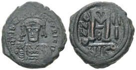 Maurice Tiberius, AD 582-602. AE, Follis. 12.30 g. 28.55 mm. Constantinople.
Obv: DN TIBER MAVRICI P(?). Crowned, draped and cuirassed bust facing, ho...