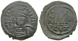 Heraclius, AD 610-641. AE, Follis. 12.00 g. 31.68 mm. Cyzicus.
Obv: dN hRACLI-PERP AVG. Plumed-helmeted and cuirassed bust facing, bearded, holding cr...