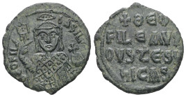 Theophilus, AD 829-842. AE, Half Follis. 3.46 g. 22.29 mm. Constantinople.
Obv: ΘEOFIL-bASIL. Crowned, three-quarter length figure of Theophilus facin...