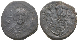Michael VII Ducas, AD 1071-1078. AE, Follis. 7.04 g. 26.01 mm. Constantinople.
Obv: Frontal bust of Christ bearded, with cross behind head, wearing tu...