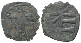 Andronicus II Palaeologus and Michael IX. AD 1282-1328. AE, Assarion. 1.24 g. 21.83 mm. Constantinople.
Obv: Andronicus on left and Michael on right b...