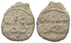 PB Byzantine seal of Theodore, imperial spatharios (8th–9th century AD)
Obv.: Cruciform invocative monogram (type VIII): Κύριε βοήθει; in the quarters...