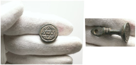 Islamic stamp seal with incised hexagram motif and dots (c. 13th century AD)
Bronze stamp seal with a circular bezel featuring an incised hexagram (si...