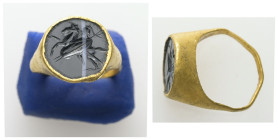 Greco-Roman gold finger ring (c. 3rd century AD)
Gold finger-ring set with an intaglio depicting a helmeted horseman riding to the left.
The figure is...