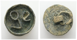 AE Early Byzantine bronze bread stamp (5th–7th century AD)
Circular bronze bread stamp with three raised Greek letters. The back is plain with a proje...