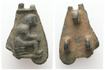 Bronze fitting with seated figure (c. 3rd–7th century AD)
Cast bronze mount depicting a seated human figure in relief, shown in profile with knees dra...