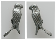 AR Roman Silver Eagle Statuette (AD 1st–2nd centuries).
A miniature silver eagle with folded wings and incised details.
Weight: 1.89 g. 
Diameter: 20....