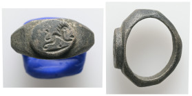 AE, Finger-ring
Bronze finger-ring; hoop slender at back.
Weight: 8.75 g. 
Diameter: 17.96 mm.