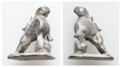 AR Roman Silver Eagle Statuette (AD 1st–2nd centuries). 
A miniature silver eagle with folded wings and incised details.
Weight: 11.00 g. 
Diameter: 2...