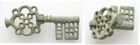 Middle Byzantine key-ring (AD 10th–11th century)
Copper alloy key attached to large with oval bezel; rectangular bit pierced with two slits.
Weight: 1...