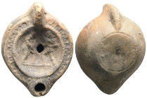 Roman terracotta lamp oil.
Weight: 53.73 g.
Diameter: 80.24 mm.