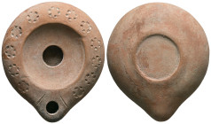 Roman terracotta lamp oil.
Weight: 72.10 g.
Diameter: 92.73 mm.