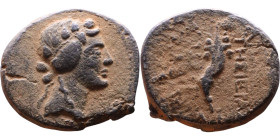 Syria: Apameia ad Orontem Semi-autonomous issue. (I Century BC) Bronze coin. Obv: Head of Dionysus right Rev: cornucopiae

21mm 6,77g

Artificial ...