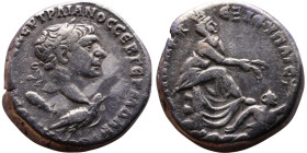 Trajan (98-117) Tetradrachm Obv: Laureate head right supported by eagle standing right Rev: Tyche seated left on rock, holding corn-ears; river-god sw...