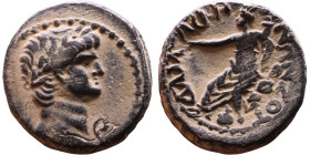 Nero (54-68) Damascus, Syria. Bronze coin. Obv:Laureate, draped bust of emperor. Rev: Tyche seated left on rock with arm outstretched, holding cornuco...