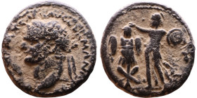 Domitian (81-96) Judaea Caesarea Maritima Bronze coin. Obv: Laureate, draped bust of emperor. Rev: Minerva standing, left, erecting trophy with her ri...