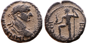 Trajan (98-117) Berytus, Bronze coin. Obv: Laureate, draped bust of emperor. Rev: Nude Neptune standing with foot on prow, left, holding dolphin and t...