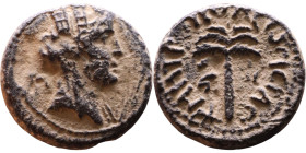 Tyre, Phoenicia (I century) Bronze coin. Obv: Turreted head of Tyche right, palm branch over shoulder Rev: Palm tree 

16mm 3,18g

Artificial sand...
