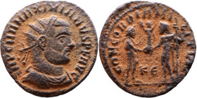 Maximianus. (286-305 ). Æ Antoninian. Obv: Radiate cuirassed bust of Maximianus right. Rev: CONCORDIA MILITVM. Jupiter standing left presents Victory ...