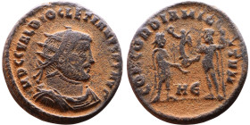 Diocletian (284-305). Antoninianus. Obv.: Bust of Diocletian, radiate, draped, right. Rev.: CONCORDIA MILITVM Diocletian, draped, cuirassed, standing ...