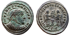 Constantinus I (306-337) Follis. Obverse: IMP CONSTAN-TINVS AVG, high crested helmet, cuirassed bust Reverse: VICTORIAE LAETAE PRINC PERP, two Victori...