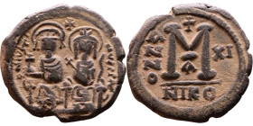 Justin II and Sophia (565-578) Follis Obverse: DN IVSTINVS PP AVG Justin and Sophia on thrones Reverse: Large M between ANNO and regnal year, above cr...