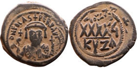 Phocas (602-610) Follis. Obverse: DN FOCA PERP AVG Crowned bust facing, wearing consular robes, holding mappa and eagle-tipped scepter , Reverse: Larg...
