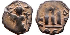 Constans II (641-668) Follis. Obverse: Imperial figure holding cross and globus Reverse: m and inscription

19mm 3,62g

Artificial sand patina