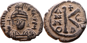Maurice Tiberius (582-602) Half Follis. Obverse: Helmeted and cuirassed bust facing, holding globus cruciger and shield., Reverse: Large K above cross...