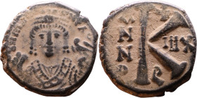 Maurice Tiberius (582-602) Half Follis Obverse: Crowned bust facing, wearing consular robes, holding mappa and eagle-tipped scepter , Reverse: Large K...