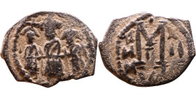 Heraclius, Martina and Heraclius Constantine (610-641) Follis Obverse: From left, Martina, Heraclius, heraclius Constantine Reverse: Large M, ANNO,
...