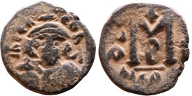 Constans II (641-668) Follis. Obverse: Imperial figure holding cross and globus Reverse: m and inscription

21mm 3,64g

Artificial sand patina