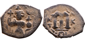 Constans II (641-668) Follis. Obverse: Imperial figure holding cross and globus Reverse: m and inscription

21mm 3,24g

Artificial sand patina