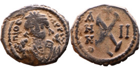 Maurice Tiberius (582-602) Decanummium Obverse: Crowned bust facing, wearing consular robes, Reverse: Large X

19mm 2,13g

Artificial sand patina