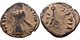 al-Malik ibn Marwan (687-705) Follis. Obverse: Standing caliph Reverse: Modified cross potent set on steps

19mm 2,49g

Artificial sand patina