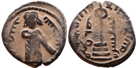 al-Malik ibn Marwan (687-705) Follis. Obverse: Standing caliph Reverse: Modified cross potent set on steps

18mm 3,00g

Artificial sand patina