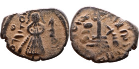 al-Malik ibn Marwan (687-705) Follis. Obverse: Standing caliph Reverse: Modified cross potent set on steps

19mm 2,16g

Artificial sand patina