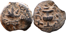 JUDAEA. Jerusalem mint. First Jewish Revolt (66-70 AD). AE prutah. Obv.: Two handled amphora. Rev.: vine leaf on small branch, bears the legend "for t...