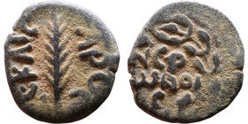 JUDAEA. Jerusalem mint. Porcius Festus (time of Nero, 59-62 AD). Bronze Prutah. Obv.: Palm-branch surrounded by L C•KAIC-APOC. Rev.: NEP • ωNO • C in ...